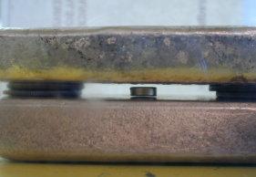 Closeup of levitating magnet